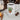 Glossy white ceramic mug with cute potted succulent and "I Wet My Plants" text in morning light on windowsill