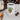 Glossy white ceramic mug with cute potted succulent and "I Wet My Plants" text in morning light on windowsill