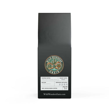 Rock Creek Root Roast medium roast coffee bag with rustic plant-themed packaging and cup of brewed coffee on wooden table